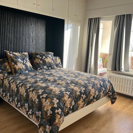 Ruim Appartement Met Zeezicht บลังเคนเบอร์เก ภายนอก รูปภาพ